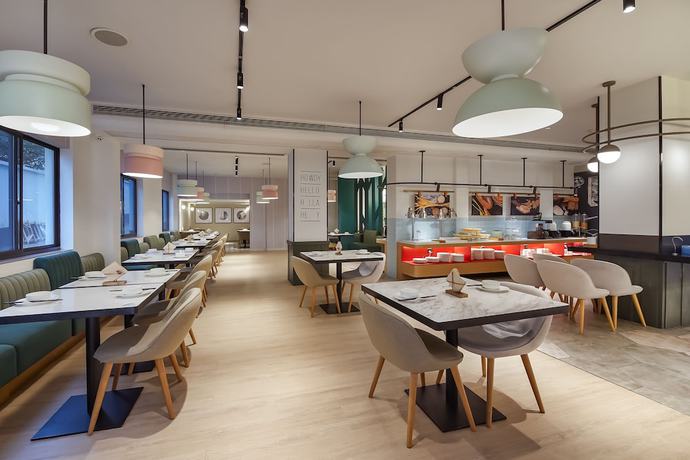 Imagen del bar/restaurante del Hotel Ibis Styles Suzhou Sports Center. Foto 5