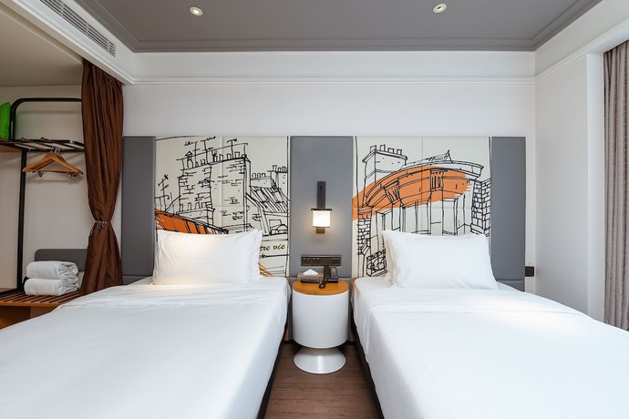 Imagen de la habitación del Hotel Ibis Styles Suzhou Sports Center. Foto 9