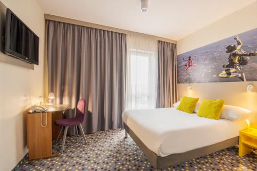 Imagen de la habitación del Hotel Ibis Styles Warszawa West. Foto 8
