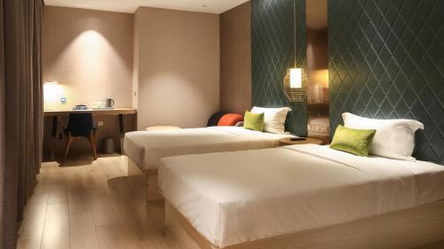 Imagen general del Hotel Ibis Styles Xm Zhongshan. Foto 1