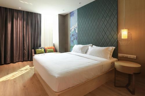 Imagen de la habitación del Hotel Ibis Styles Xm Zhongshan. Foto 6