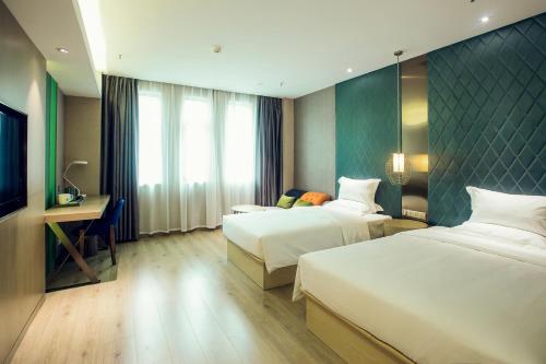 Imagen general del Hotel Ibis Styles Xm Zhongshan. Foto 2