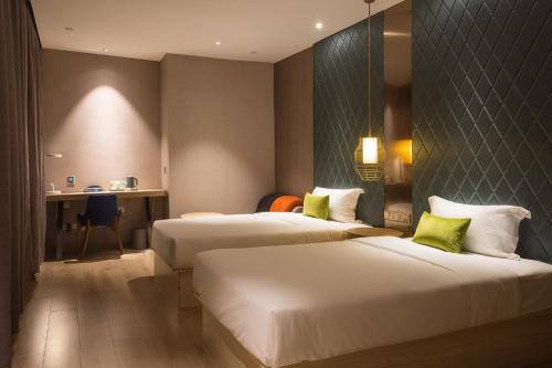 Imagen general del Hotel Ibis Styles Xm Zhongshan. Foto 3