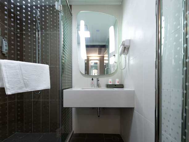 Imagen de la habitación del Hotel Ibis Suzhou Sanxiang Road. Foto 19