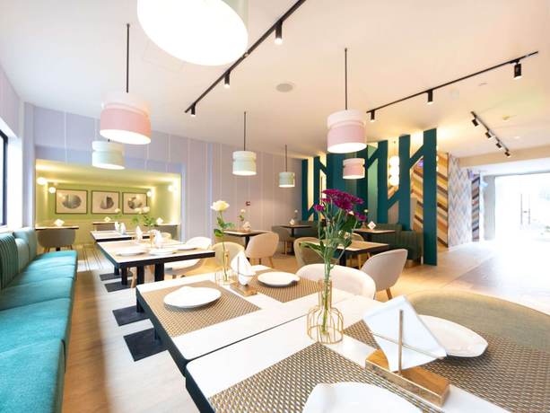Imagen del bar/restaurante del Hotel Ibis Suzhou Sanxiang Road. Foto 8