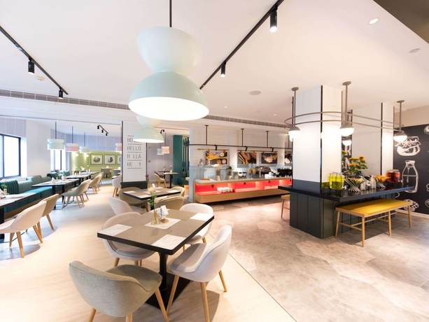 Imagen del bar/restaurante del Hotel Ibis Suzhou Sanxiang Road. Foto 10