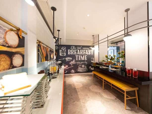 Imagen del bar/restaurante del Hotel Ibis Suzhou Sanxiang Road. Foto 11