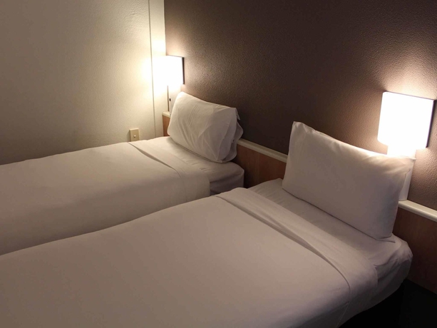 Imagen de la habitación del Hotel Ibis Sydney Thornleigh. Foto 14