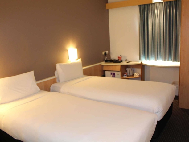 Imagen de la habitación del Hotel Ibis Sydney Thornleigh. Foto 15
