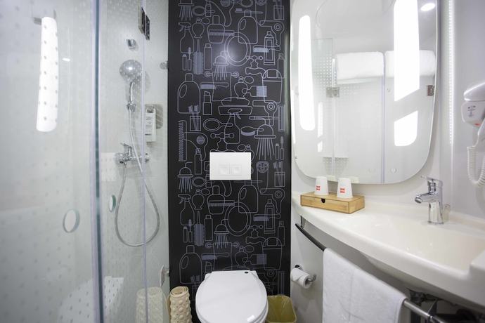 Imagen de la habitación del Hotel Ibis Taicang Center Plaza. Foto 12