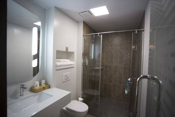 Imagen de la habitación del Hotel Ibis Taicang Center Plaza. Foto 13