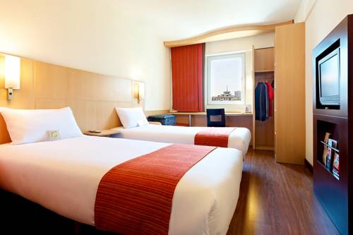 Imagen de la habitación del Hotel Ibis Tianjin Railway Station. Foto 3