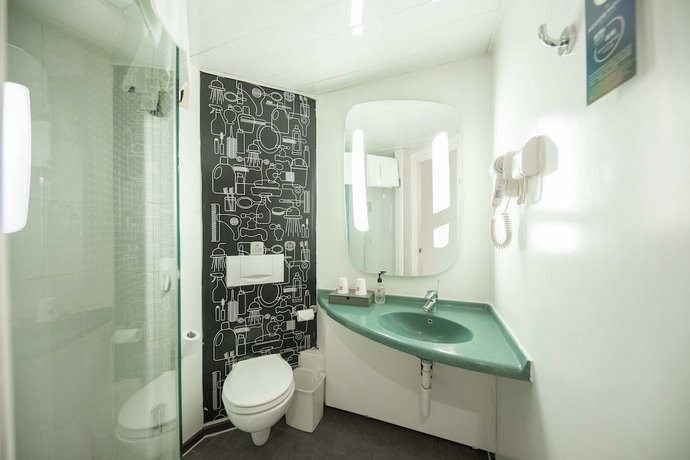 Imagen de la habitación del Hotel Ibis Tianjing Teda. Foto 11