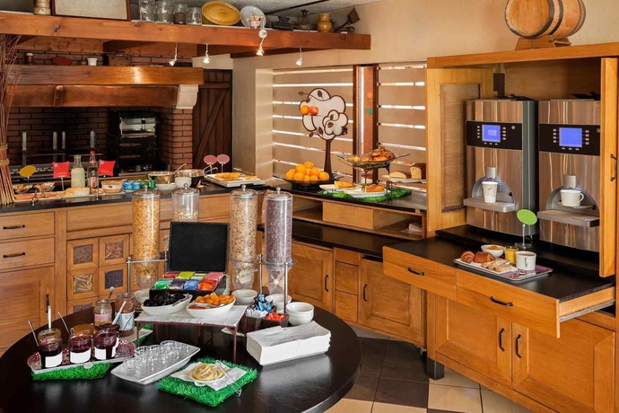 Imagen del bar/restaurante del Hotel Ibis Toulouse Airport. Foto 5