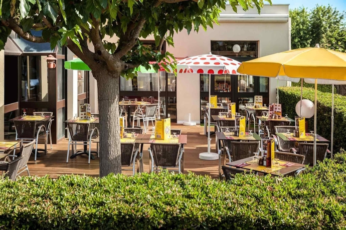 Imagen del bar/restaurante del Hotel Ibis Toulouse Airport. Foto 9