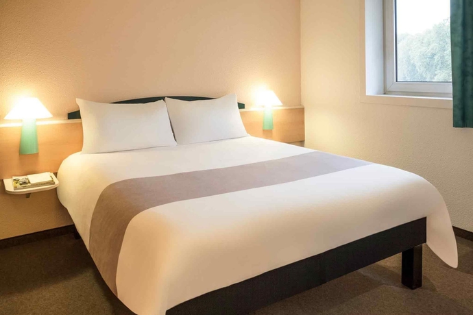 Imagen de la habitación del Hotel Ibis Toulouse Ponts Jumeaux. Foto 11