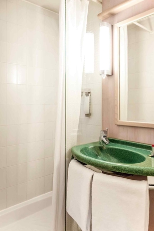 Imagen de la habitación del Hotel Ibis Toulouse Ponts Jumeaux. Foto 12