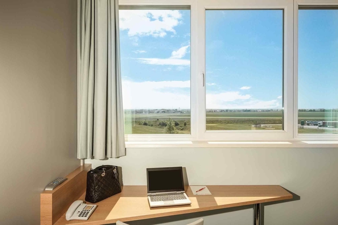 Imagen de la habitación del Hotel Ibis Vienna Airport. Foto 12