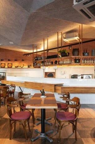 Imagen del bar/restaurante del Hotel Ibis Vitoria Praia Do Canto. Foto 15