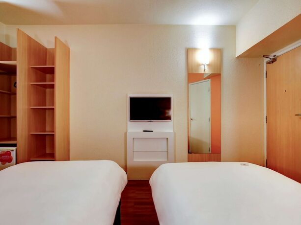 Imagen de la habitación del Hotel Ibis Vitoria Praia Do Canto. Foto 29