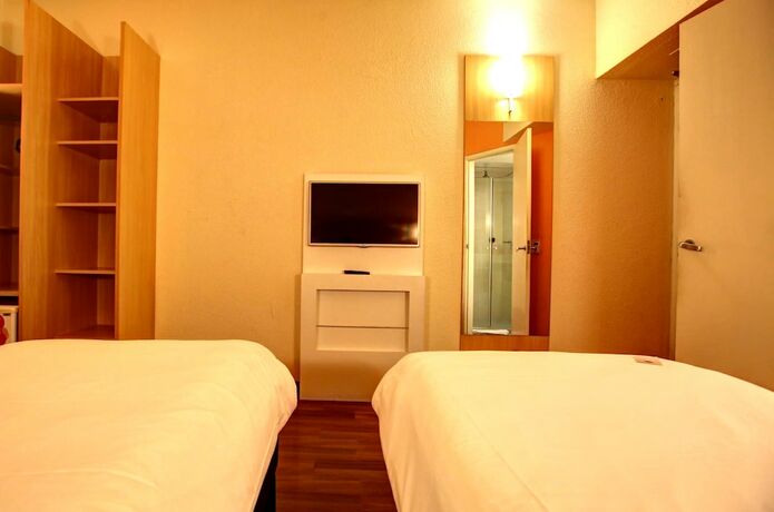 Imagen de la habitación del Hotel Ibis Vitoria Praia Do Canto. Foto 31