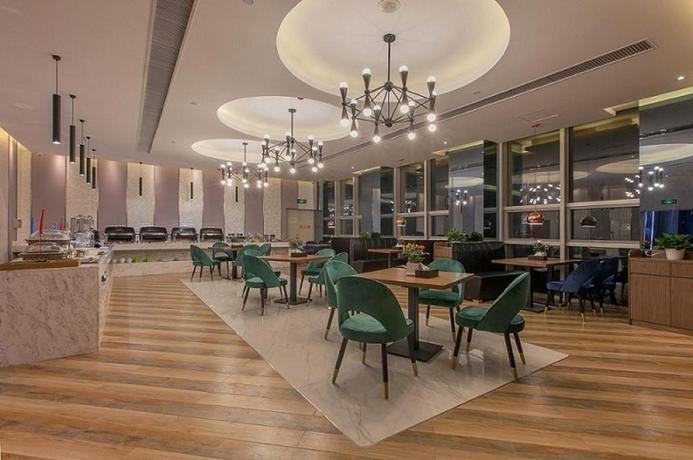Imagen del bar/restaurante del Hotel Ibis Wuhan Optic Valley. Foto 5