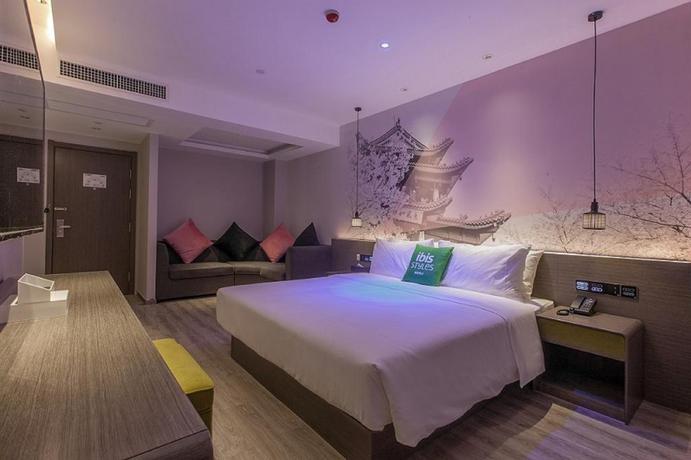 Imagen de la habitación del Hotel Ibis Wuhan Optic Valley. Foto 11