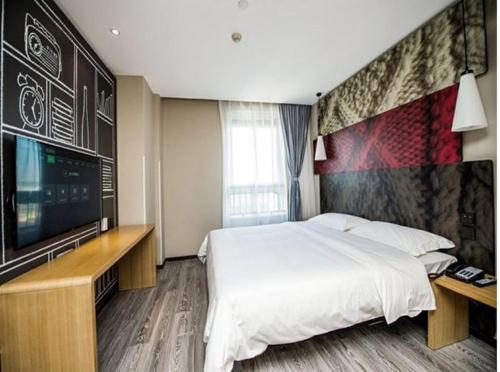 Imagen general del Hotel Ibis Wuxi Jiangnan University. Foto 1