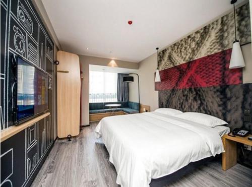 Imagen de la habitación del Hotel Ibis Wuxi Jiangnan University. Foto 8