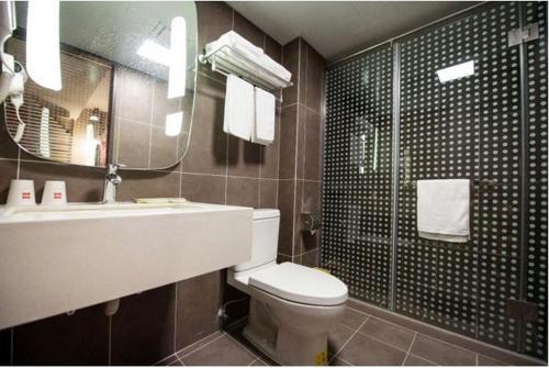 Imagen de la habitación del Hotel Ibis Wuxi Jiangnan University. Foto 9
