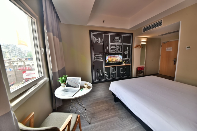 Imagen de la habitación del Hotel Ibis Xiamen Kaiyuan. Foto 13