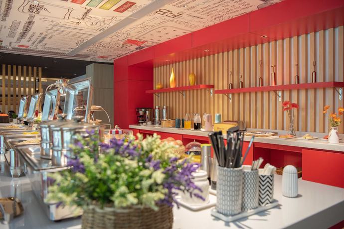 Imagen de los interiores del Hotel Ibis Xinzhou Qiyi Road. Foto 16