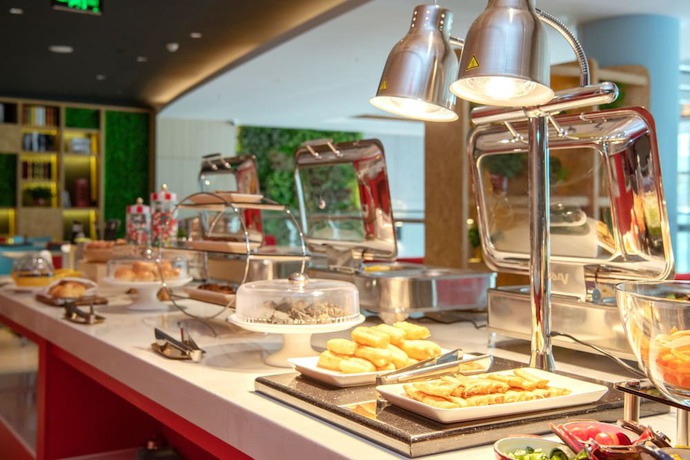 Imagen del bar/restaurante del Hotel Ibis Xinzhou Qiyi Road. Foto 5