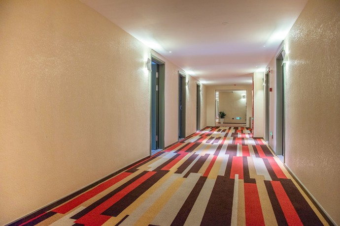 Imagen de los interiores del Hotel Ibis Xinzhou Qiyi Road. Foto 18