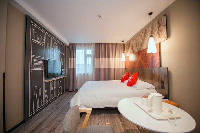 Imagen de la habitación del Hotel Ibis Yangzhou Garden. Foto 15