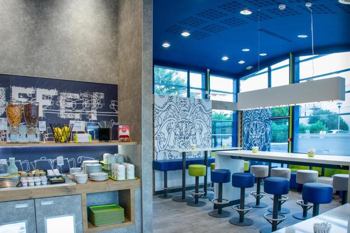 Imagen del bar/restaurante del Hotel Ibis budget Montpellier Sud Près d'Arènes. Foto 3