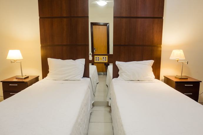 Imagen de la habitación del Hotel Ibituruna Center. Foto 2
