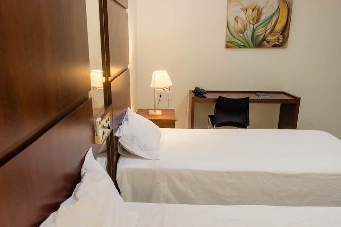 Imagen de la habitación del Hotel Ibituruna Center. Foto 4