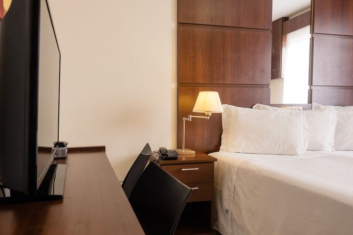 Imagen de la habitación del Hotel Ibituruna Center. Foto 11