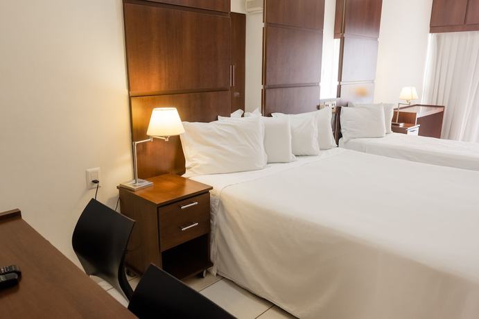 Imagen de la habitación del Hotel Ibituruna Center. Foto 13
