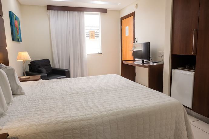 Imagen de la habitación del Hotel Ibituruna Center. Foto 17