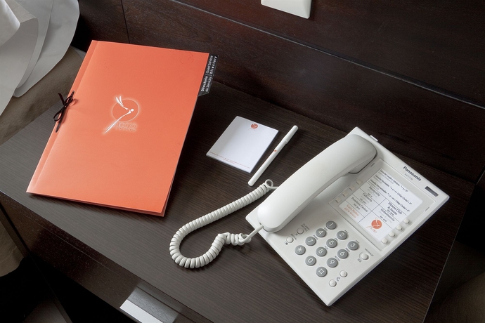 Imagen de la habitación del Hotel Icaro Suites. Foto 5