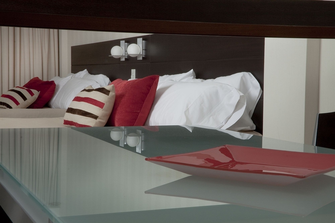 Imagen de la habitación del Hotel Icaro Suites. Foto 6