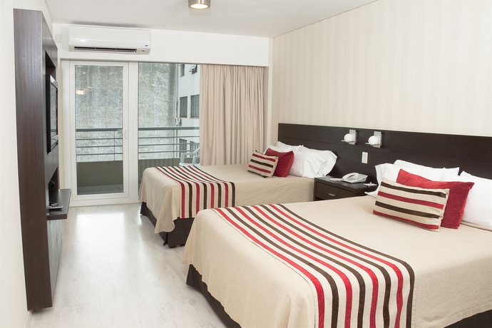 Imagen de la habitación del Hotel Icaro Suites. Foto 7