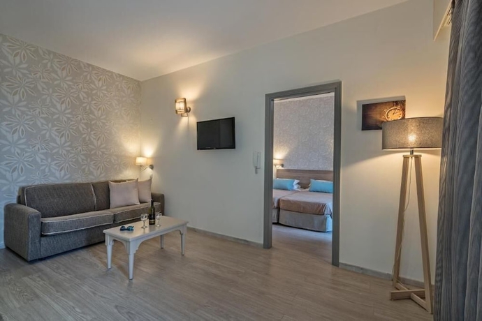 Imagen de la habitación del Hotel Icarus Suite Apartments. Foto 6