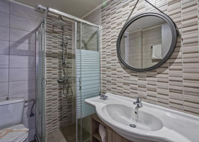 Imagen de la habitación del Hotel Icarus Suite Apartments. Foto 7