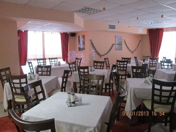 Imagen del bar/restaurante del Hotel Iceberg Apart Hotel and SPA. Foto 7