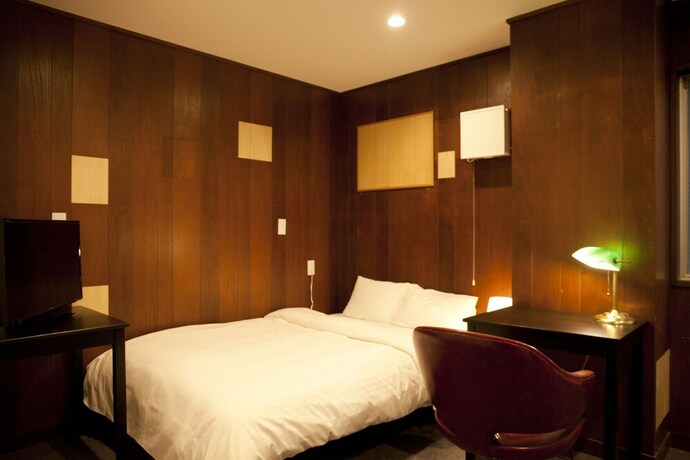 Imagen de la habitación del Hotel Ichinichi. Foto 15