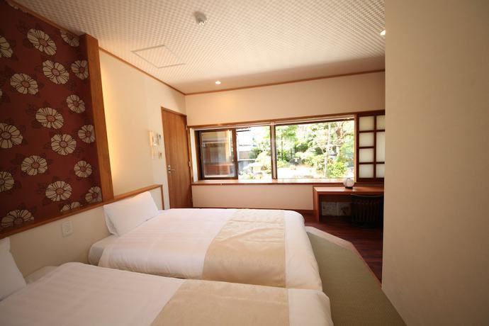 Imagen de la habitación del Hotel Ichinomatsu Japanese Modern. Foto 19