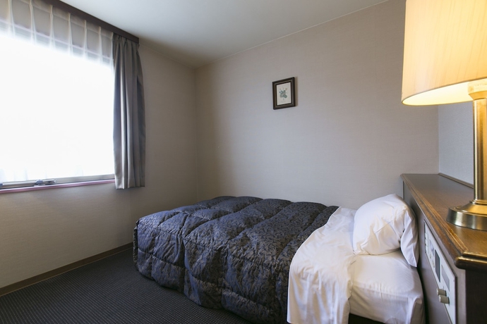 Imagen de la habitación del Hotel Ichinomiya City. Foto 7